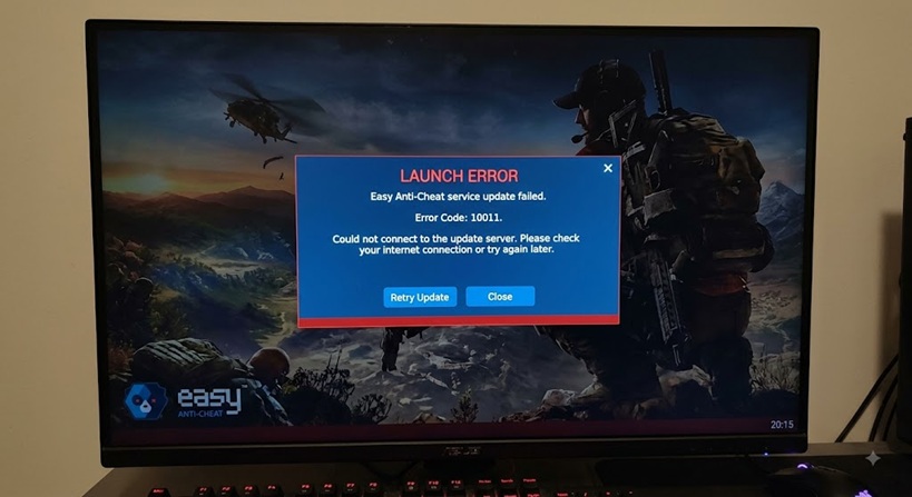 A digital display showing a Ghost Recon Wildlands launch error screen and Easy Anti-Cheat service update failed warning